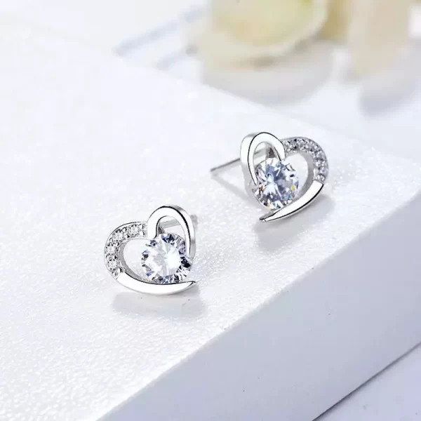 ARETES EN FORMA DE CORAZON CON INCRUSTACIONES BRILLANTES - Imagen 2